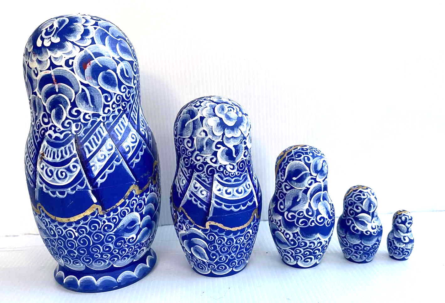 Artists Matryoshka Woman clasping hands