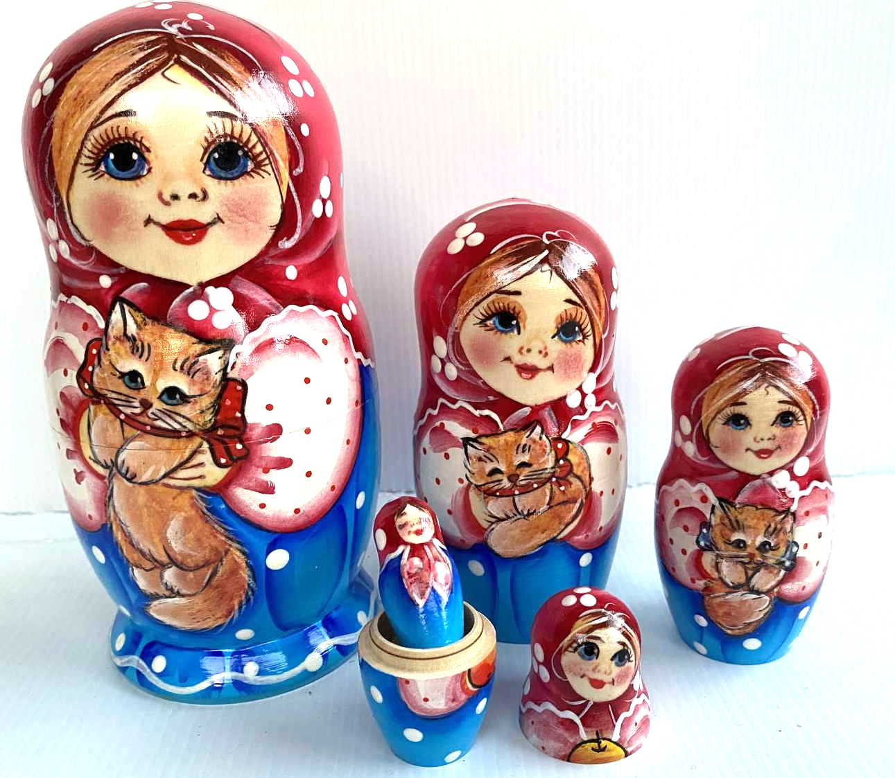 Artists Matryoshka Elena holding cat