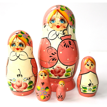 A 5 Nested set of Artists Matryoshka -  Pink girl with pink flower on apron and white dots - finger on cheek