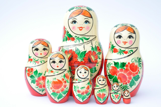 A 8 Nested Set of Vyatka Matryoshka, Red & white shawl