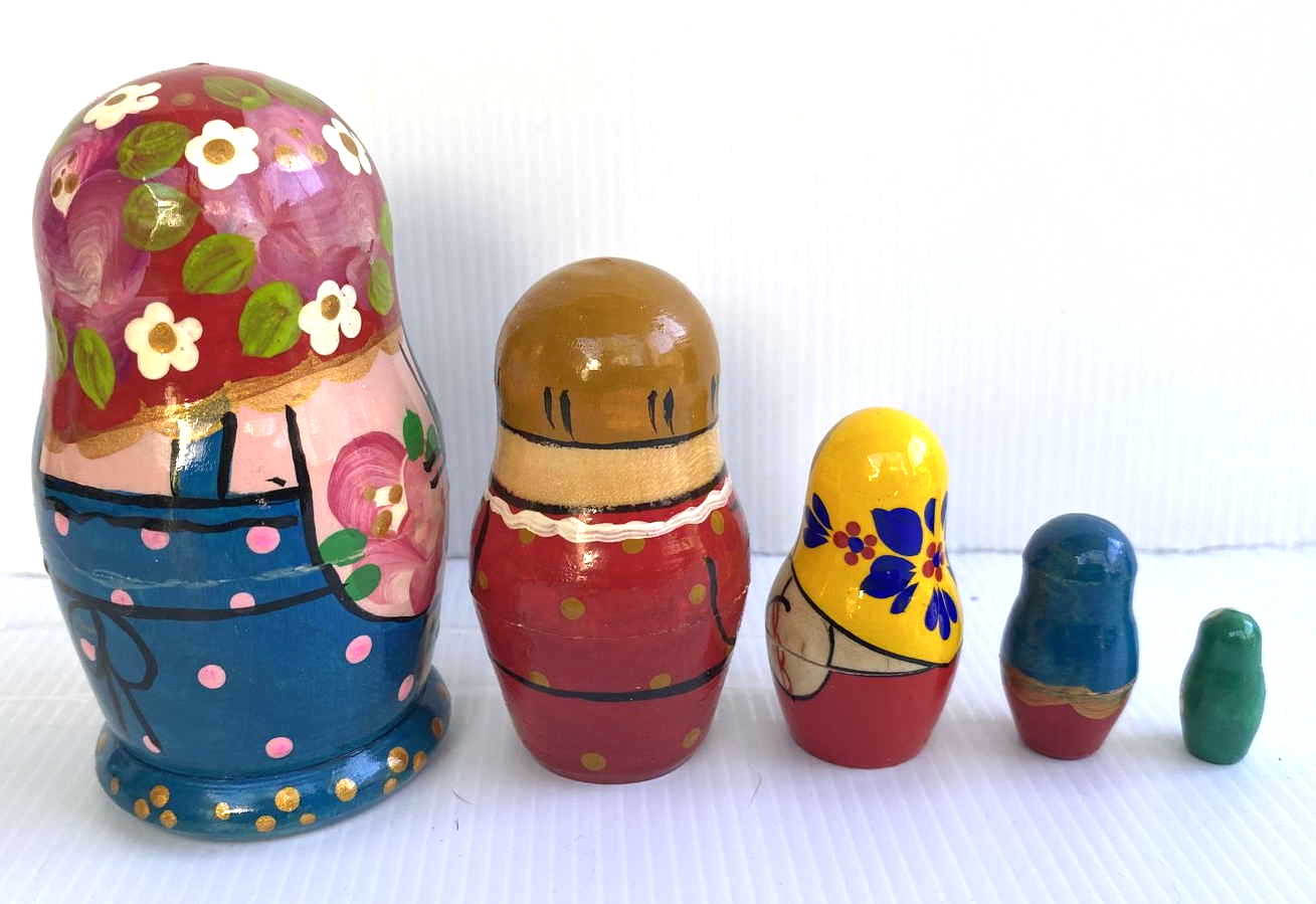 Artists Matryoshka - peasant woman with chicken