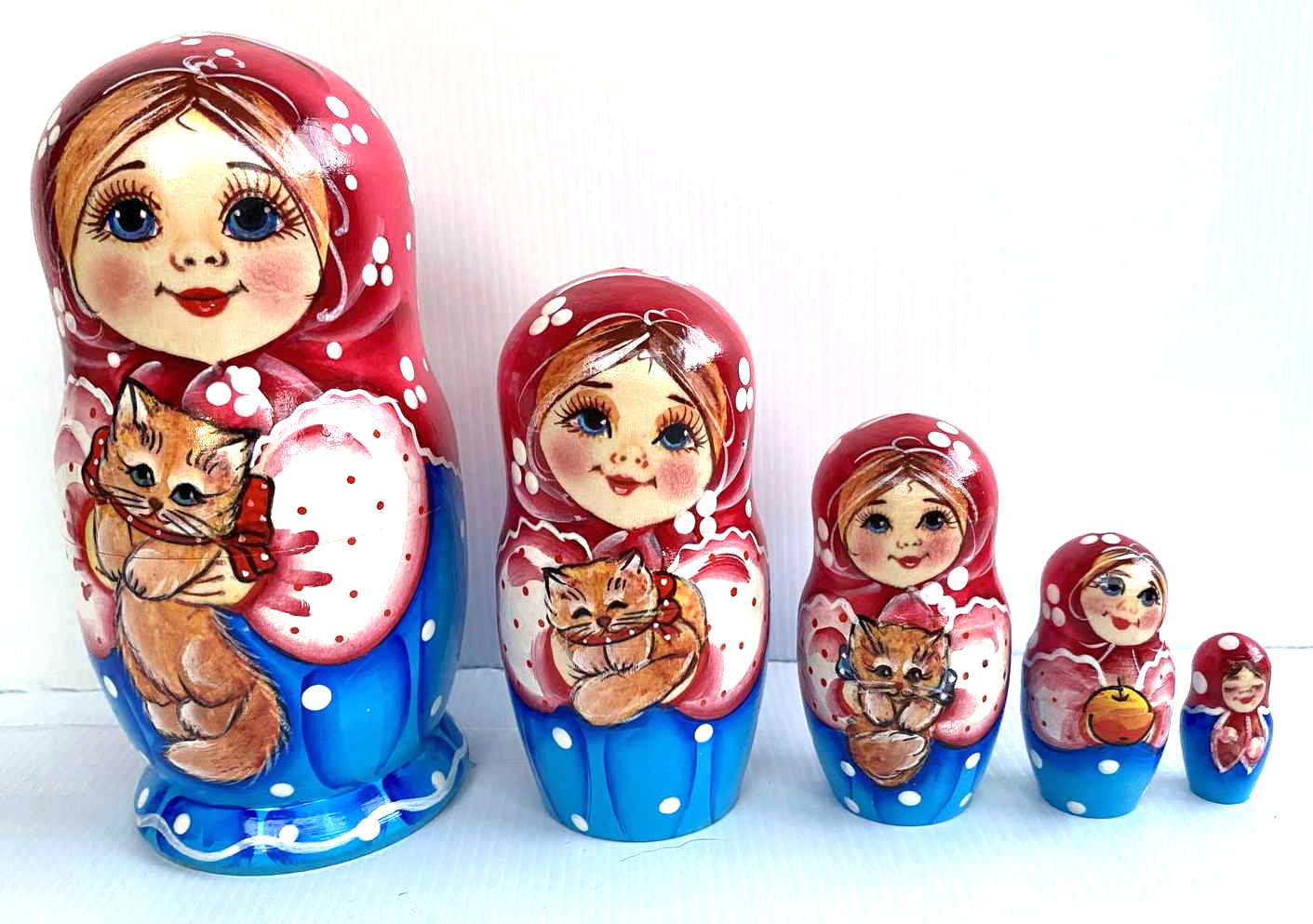 Artists Matryoshka Elena holding cat