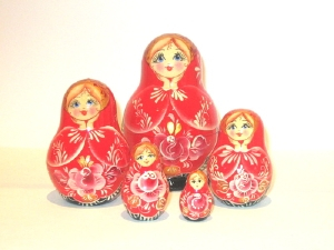 A 5 Nested set of Artists Matryoshka, Red girl/red flower